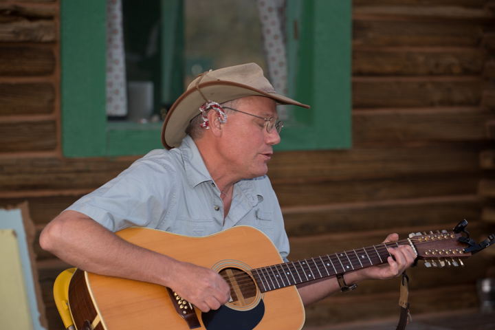 Music on the porch at the log cabin